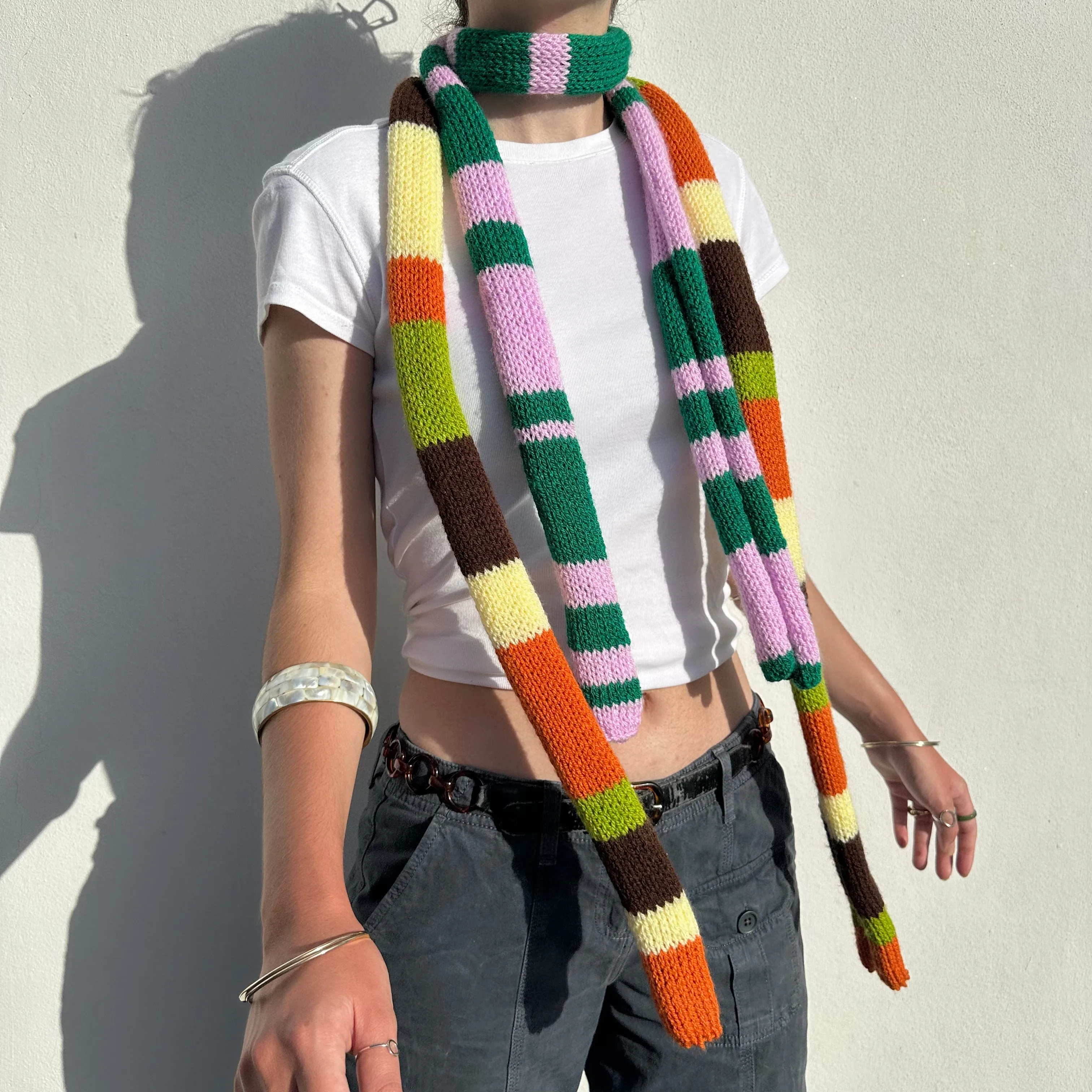 The Linea Scarf - handmade knitted stripy skinny scarf in orange, brown green and yellow